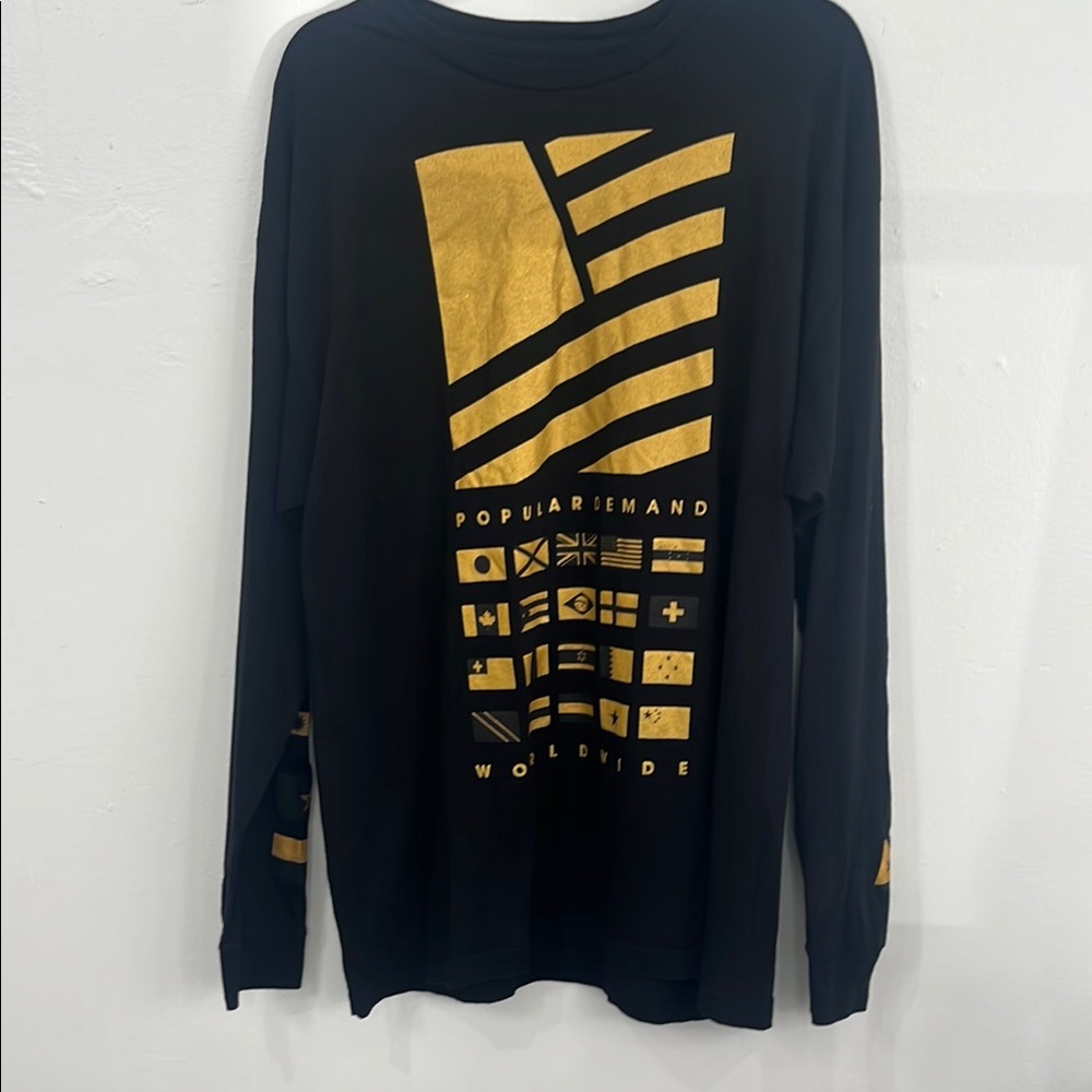 Stylish Black and Gold Long Sleeve Tee with Graphic Design